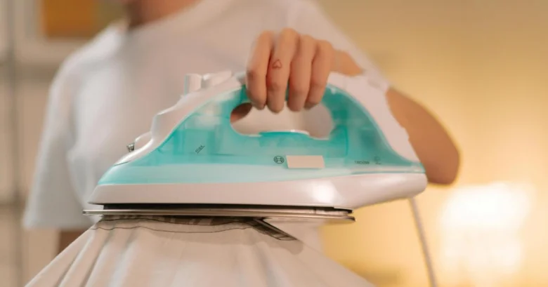 Person ironing clothes