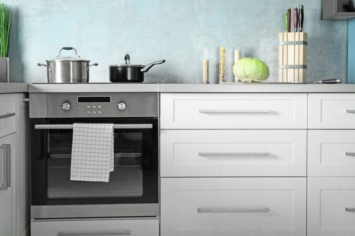 Kitchen with oven and stovetop