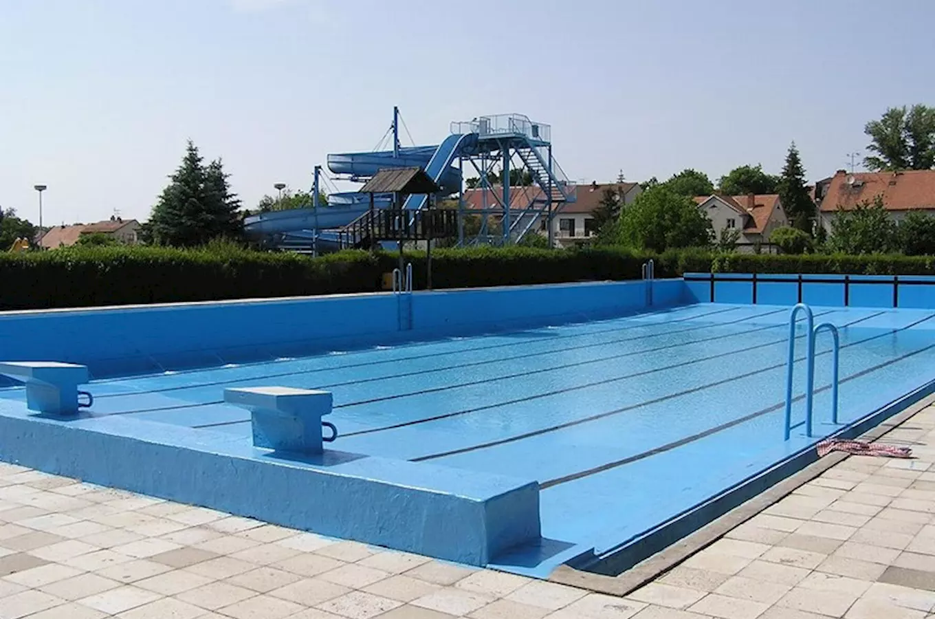 Outdoor swimming pool with slides