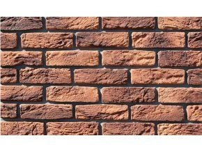 Detailní pohled na cihlovou zeď jako příklad obložení soklu domu.