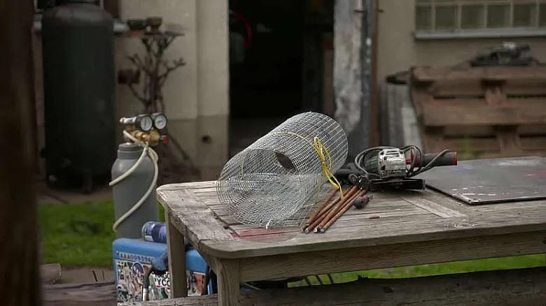 Wire mesh and tools on table