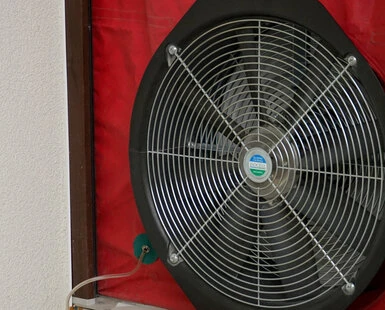 Industrial fan with red cover