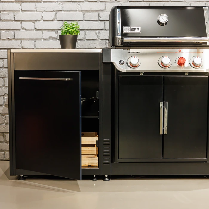 Outdoor kitchen with grill and storage