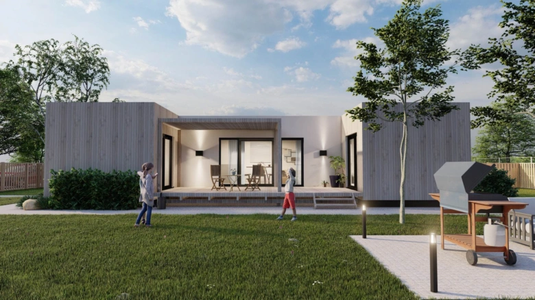 Moderní modulový dům s dřevěnou fasádou na pozadí zelené trávy.
