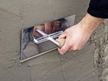 Plastering tool on wall