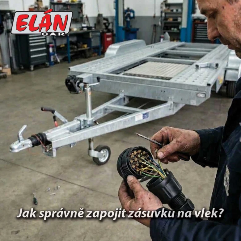 Muž zapojuje elektrickou zásuvku na přívěsový vozík v dílně.